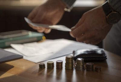 close up coins saved energy crisis expenses
