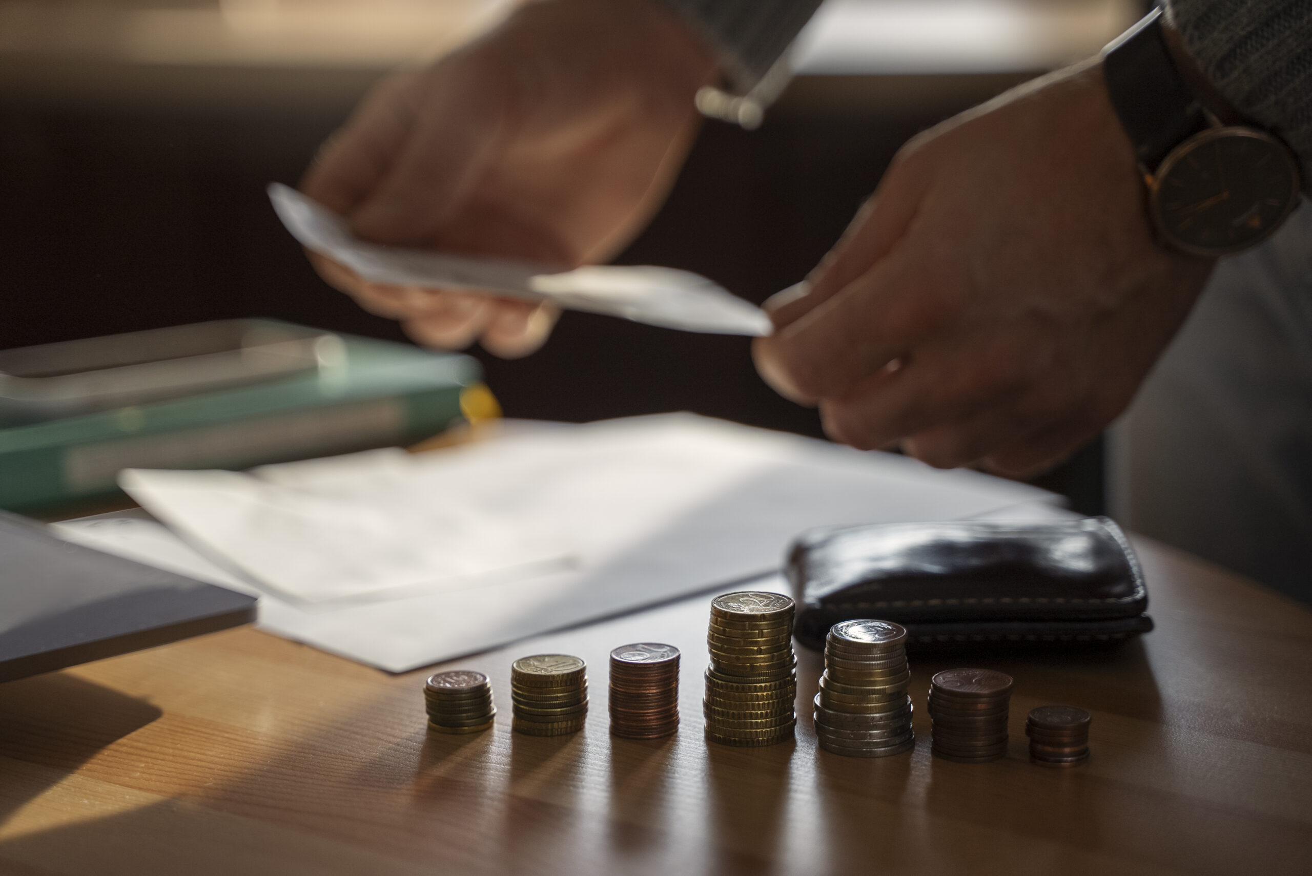 close up coins saved energy crisis expenses